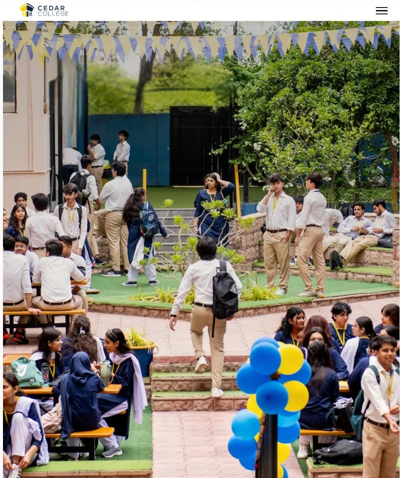 Cedar College homepage on a tablet, with the logo, menu button and campus photo